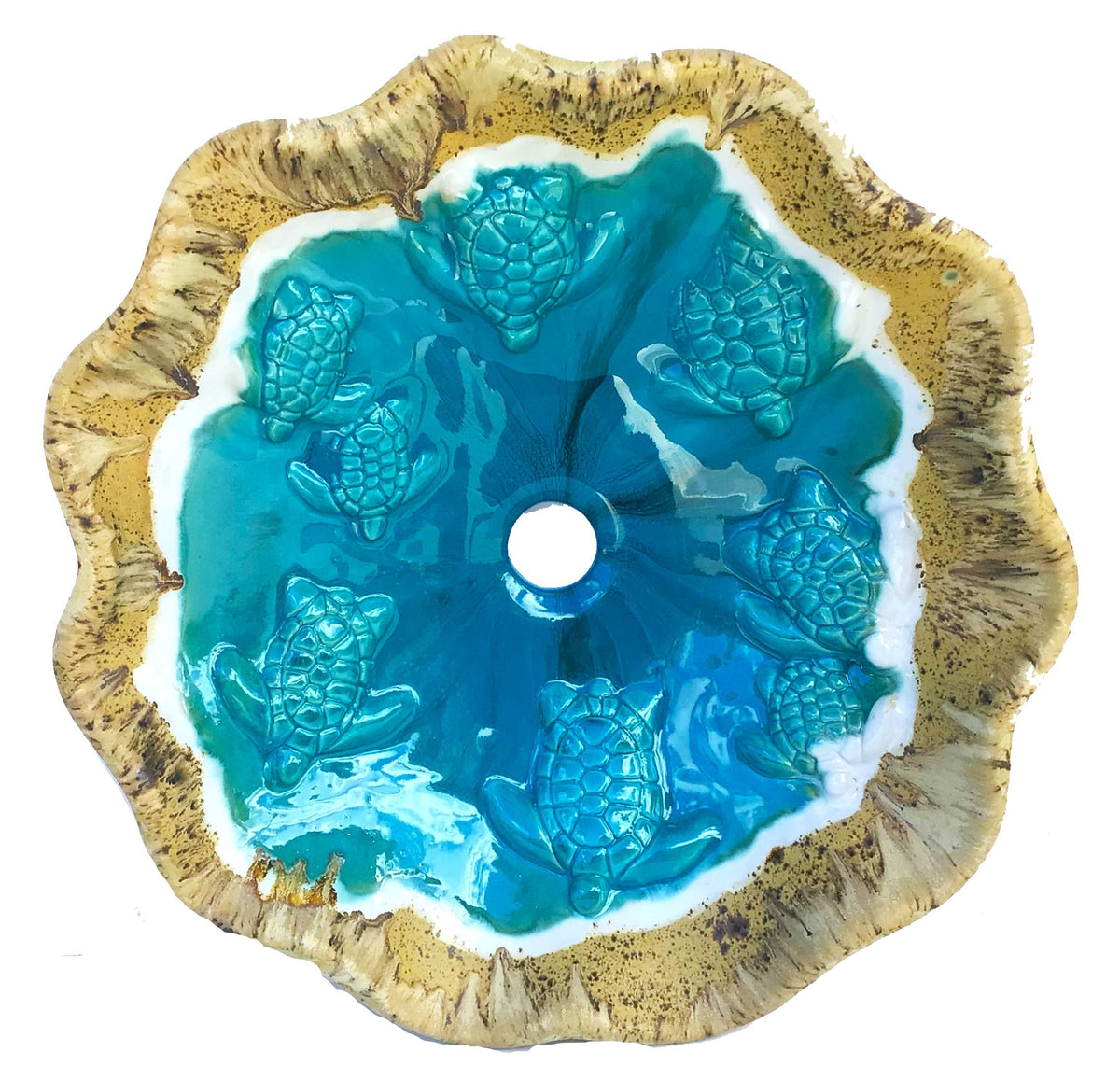Above vessel bathroom sink, with ultra turquoise & sandstone glazes, and eight relief turtles.